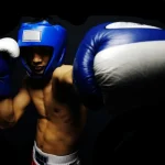 A boxer throwing a jab